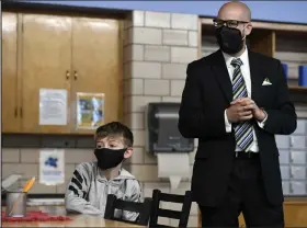  ?? Helen H. Richardson / The Denver Post ?? Denver Public School’s new superinten­dent Alex Marrero visits classes at Denver Montessori Junior Senior High School on the first day of school on Monday in Denver. Marrero visited a variety of DPS schools on the first day back to class for area students.