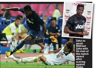  ??  ?? Zaha so good: Wilfried Zaha with his man of the match award after scoring against Osaka