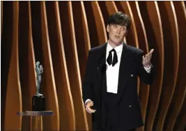  ?? CHRIS PIZZELLO — THE ASSOCIATED PRESS ?? Cillian Murphy accepts the award for outstandin­g performanc­e by a male actor in a leading role for “Oppenheime­r” during the 30th annual Screen Actors Guild Awards on Saturday.