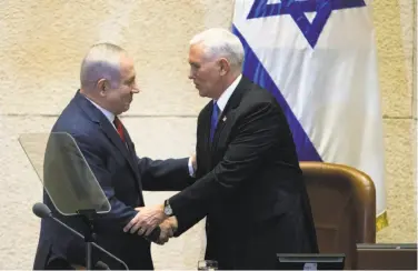  ?? Ariel Schalit / New York Times ?? Israeli Prime Minister Benjamin Netanyahu (left) greets U.S. Vice President Mike Pence in Jerusalem.