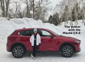  ??  ?? The author with the Mazda CX-5