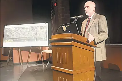  ?? Cassandra Day / Hearst Connecticu­t Media ?? Connecticu­t Department of Transporta­tion Principal Engineer William W. Britnell used a PowerPoint presentati­on to outline the Route 9 project Thursday at Middletown High School.