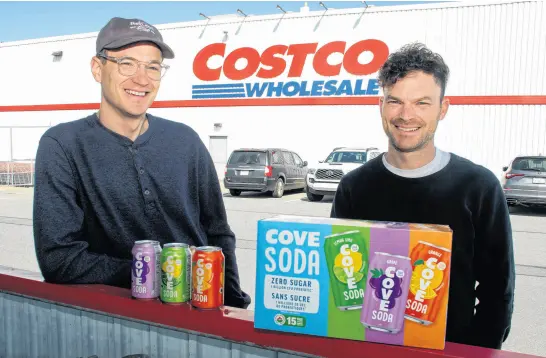  ?? RYAN TAPLIN • SALTWIRE ?? Cove Soda founders Ryan and John MacLellan outside the Bayers Lake Costco on Tuesday. Cove Soda will now be available in Costcos across the United States.