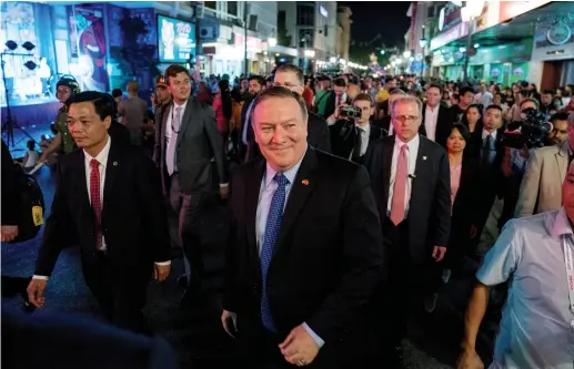  ?? (Reuters) ?? US SECRETARY of State Mike Pompeo walks through the streets of Hanoi yesterday.