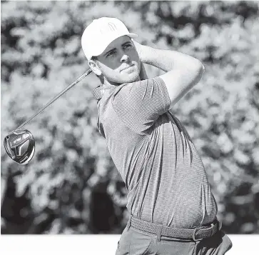  ?? PHOTO BY THE ASSOCIATED PRESS ?? Baylor School graduate Luke List watches his shot on the third hole during Saturday’s third round of the CJ Cup at Nine Bridges, a PGA Tour event in Jeju, South Korea. List led after the second round but dropped into a tie for eighth Saturday.