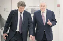  ?? DARREN CALABRESE/ THE CANADIAN PRESS ?? Conrad Black, right, with his lawyer Peter Howard at the Ontario Securities Commission in Toronto on Friday. He says he feels ‘ great remorse’ but no guilt.