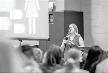  ?? Austin Dave/The Signal ?? Harmony Dust, author and founder of Treasures, shares her story of survival and struggles women encounter with about 300 people at College of the Canyons during a conference on human traffickin­g Friday.