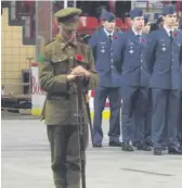  ??  ?? This young soldier’s stance at Saturday’s Remembranc­e Day Ceremony conveyed respects everyone was feeling