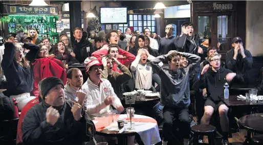  ?? PHOTO: STEPHEN JAQUIERY ?? English fans at The Bog tavern in Dunedin react after Croatia scored its second and matchwinni­ng goal in the World Cup semifinal yesterday.
About 70 patrons were at the tavern for the 6am kickoff.
The tavern operated under cafe dining laws for the...