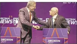  ??  ?? Mayor de Blasio and Sal Albanese shake hands before their Democratic debate last month. The rematch is Wednesday.