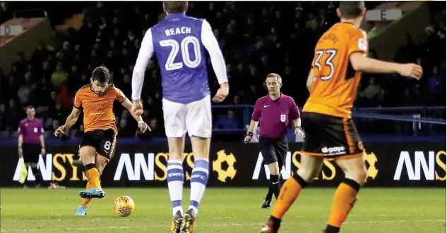  ?? PICTURES: Action Images ?? RU BEAUTY: Portuguese midfielder Ruben Neves picks his spot to score the winner for Wolves at Hillsborou­gh on Friday night