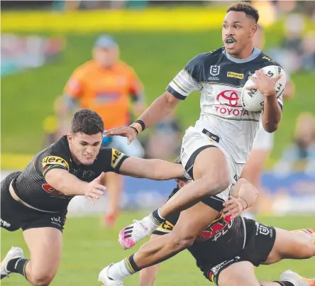  ?? Picture: GETTY IMAGES ?? The Cowboys’ Hamiso Tabuai-fidow on the charge against the Panthers.