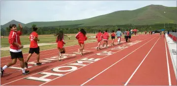  ?? RECORDER PHOTOS BY CHIEKO HARA ?? Lindsay High School hosts a track and field meet for the first time at its recently constructe­d track Wednesday in Lindsay.