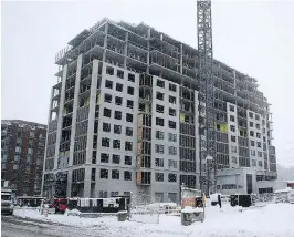  ?? JOEL CEAUSU, SPECIAL TO THE MONTREAL GAZETTE ?? Phase 1 of Équinoxe Marc Chagall, a 13-storey tower of rental units in Côte-St-Luc, is taking shape, with the first seven floors expected to be ready for occupancy on July 1 and the remainder finished by fall. Constructi­on is scheduled to begin in...