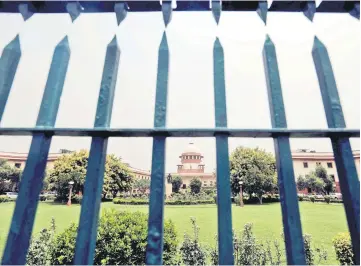  ?? Reuters photo ?? File photo shows India’s Supreme Court is pictured through a gate in New Delhi.—