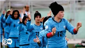  ??  ?? Will we see pictures like these under the Taliban? Afghan players are seen here during a training session in 2015 in Kabul