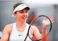  ?? AFP ?? Simona Halep needed to reach the last eight and go further than No. 2 Caroline Wozniacki to hold on to the top spot.