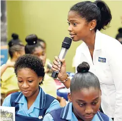  ??  ?? CB Group Brand Manager Tina Hamilton conducts a workshop on personal branding and social-media image with young women from various schools across Montego Bay.