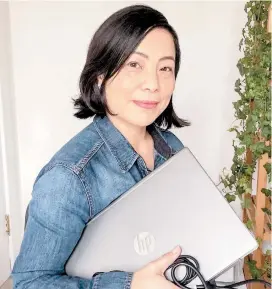  ??  ?? Joanne Jong is collecting laptops to upgrade and give to children.