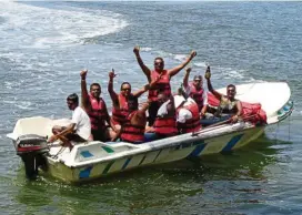  ??  ?? Superbiker­s taking time off to enjoy a boat ride to a mangrove swamp in Bentota.