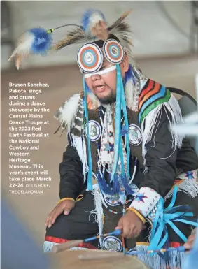  ?? THE OKLAHOMAN ?? Bryson Sanchez, Pakota, sings and drums during a dance showcase by the Central Plains Dance Troupe at the 2023 Red Earth Festival at the National Cowboy and Western Heritage Museum. This year’s event will take place March 22-24. DOUG HOKE/