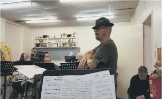  ??  ?? Dave Stewart visiting Easington Colliery Band rehearsals.
