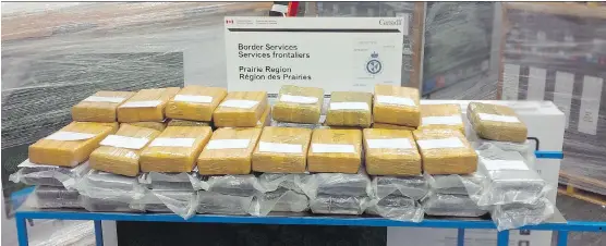  ?? CANADIAN BORDER SERVICES AGENCY ?? Sixty packages of cocaine weighing 69 kilograms were seized at the Coutts border crossing on Sept. 2, one of three such intercepti­ons within weeks.