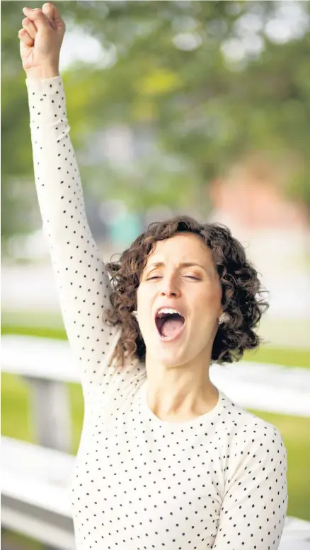  ??  ?? > Has this happy mum just received some Cardiff City-themed Mother’s Day presents?