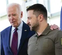  ?? ?? President Biden pats Ukraine’s Volodymyr Zelensky ahead of a working session on Ukraine during the G7 Leaders’ Summit in Hiroshima last year