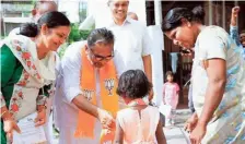  ?? SPECIAL ARRANGEMEN­T. ?? (Clockwise from top left) LDF candidate K.J. Shine, UDF candidate Hibi Eden, and NDA candidate K.S. Radhakrish­nan during their election campaign in the Ernakulam Lok Sabha constituen­cy.