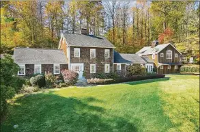  ?? Realty Plans Photograph­y / Contribute­d photo ?? The home on 215 Cross Ridge Road in New Canaan has five bedrooms and five full bathrooms spread across three levels of living space.