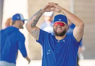  ?? FRANK GUNN/THE CANADIAN PRESS VIA AP ?? Blue Jays pitcher Alek Manoah warms up Tuesday during MLB spring training in Dunedin, Fla. Manoah went 16-7 with a 2.24 ERA in 31 starts for Toronto in 2022, but he struggled last year, going 3-9 with a 5.87 ERA in 19 starts.