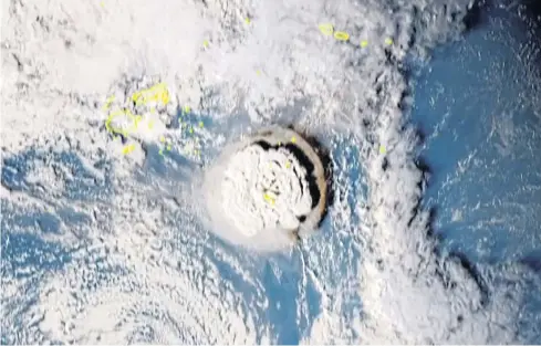  ?? AFP ?? A grab taken from footage by a Japanese satellite on Saturday shows the volcanic eruption that provoked a tsunami in Tonga.