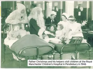  ??  ?? Father Christmas and his helpers visit children at the Royal Manchester Children’s Hospital in Pendlebury in 1946