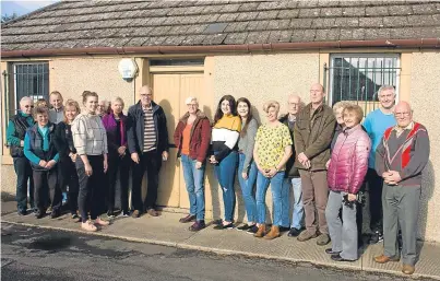  ??  ?? Back in business: Residents celebrate the funding award to take back Dunshalt’s village shop.