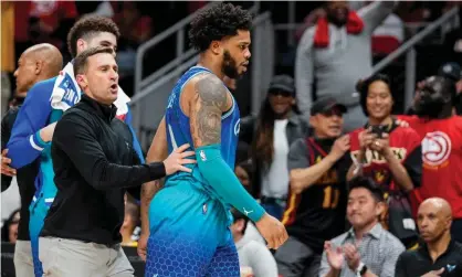  ?? Photograph: Dale Zanine/USA Today Sports ?? Miles Bridges is restrained after being ejected from Wednesday’s game against the Atlanta Hawks.