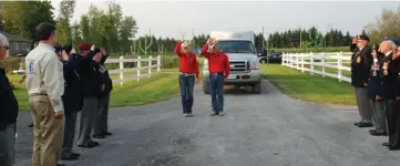  ??  ?? Members of the Hawkesbury Royal Canadian Legion Branch 472 along with MP Pierre Lemieux, Champlain Mayor Gary Barton and Champlain council member Jacques Lacelle, stood at attention and saluted Paul and Terry Nichols as they arrived at Black Tai Ranch...