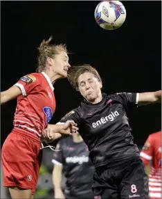  ??  ?? A heading duel between Edel Kennedy and Rachel Graham.