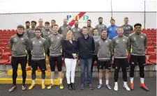  ??  ?? Members of the Sligo Rovers squad with Bernard Dwyer of PHD and his wide, Jane. Pic: Michael Melly.