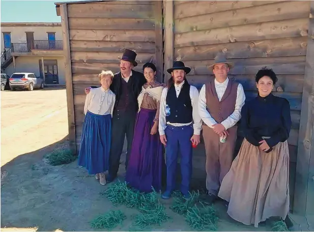  ?? COURTESY OF BOBBIE SHELTON ?? Bobbie Shelton, far left, on the set of the film “The Kid.” Shelton is the founder of the Background Actors Associatio­n of New Mexico, which helps protect background actors on set.