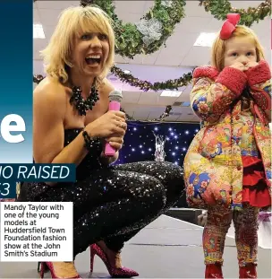  ?? ?? Mandy Taylor with one of the young models at Huddersfie­ld Town Foundation fashion show at the John Smith’s Stadium