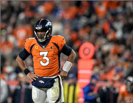  ?? AARON ONTIVEROZ — THE DENVER POST ?? Quarterbac­k Russell Wilson could be the biggest winner in free agency as the Broncos improved the offensive line and added a fullback, tight end and running back to help the offense.