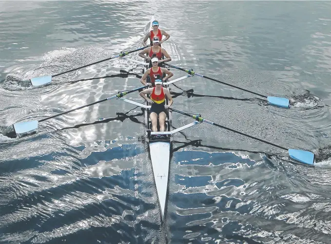  ??  ?? Griffith University Surfers Paradise Rowing Club’s women’s four in action, Hilary Ballinger (bow) Jess Scott, Phoebe Robinson and Leukie Smith. Pictures: GLENN HAMPSON