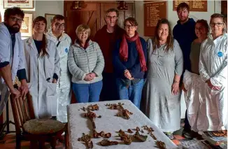  ??  ?? TOP: The ‘Finding Eanswythe’ team with what are almost certainly the bones of the seventh-century Kentish saint.