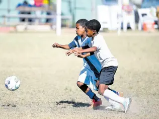  ?? FILE PHOTOS ?? Action from the recently held all-island Junior Cup at the University of the West Indies, Mona Bowl.