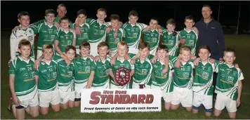  ??  ?? The Crossabeg-Ballymurn boys celebratin­g their success.