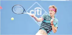  ?? — AFP photo ?? Zverev of Germany returns a backhand shot to Kei Nishikori of Japan during Day Seven of the Citi Open at the Rock Creek Tennis Centre on August 3 file photo in Washington, DC.