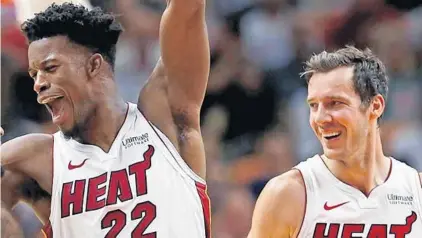  ?? DAVID SANTIAGO/MIAMI HERALD ?? The relationsh­ip between the Heat’s Goran Dragic and Jimmy Butler is something to behold, especially in the fourth quarter.