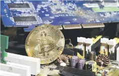  ??  ?? Bitcoin hit a fresh record of US$14,000 yesterday as investors piled in, triggering a warning the cryptocurr­ency was “like a charging train with no brakes” which would inevitably slip back. — Reuters photo