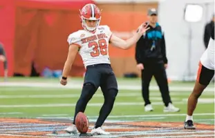  ?? BUTCH DILL/AP ?? National place kicker Chad Ryland of Maryland runs drills during practice for the Senior Bowl game in Mobile, Ala., on Thursday.